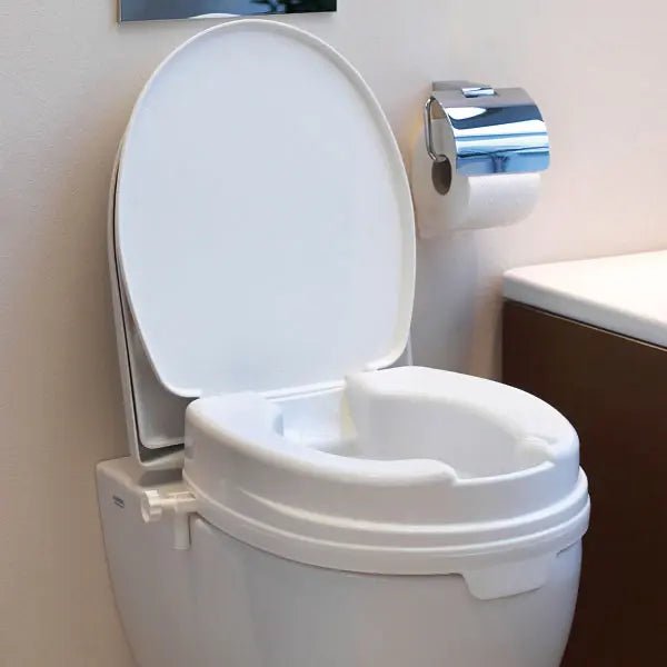 Toilettensitzerhöhung mit Deckel - weiß - Dietz GmbH