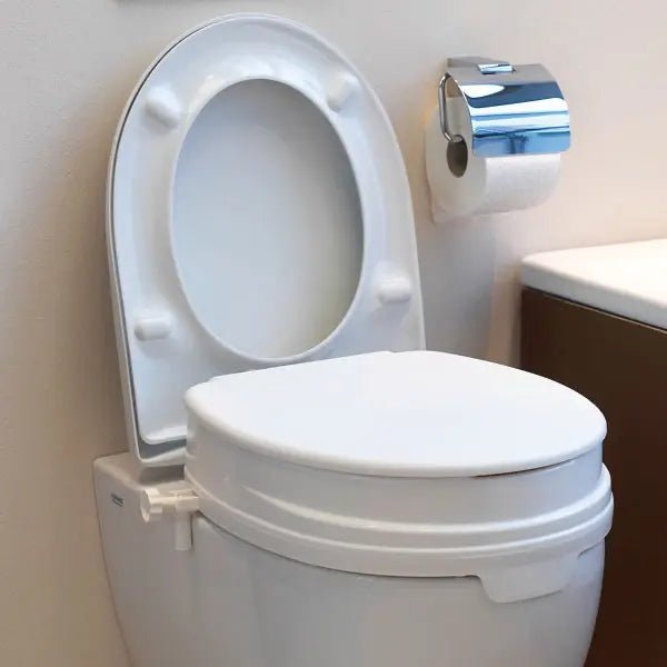 Toilettensitzerhöhung mit Deckel - weiß - Dietz GmbH
