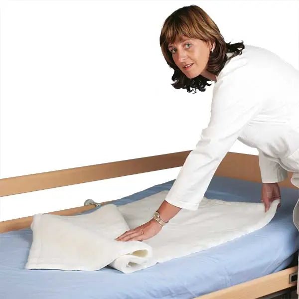 Polyfell Matratzenauflage - Servoprax